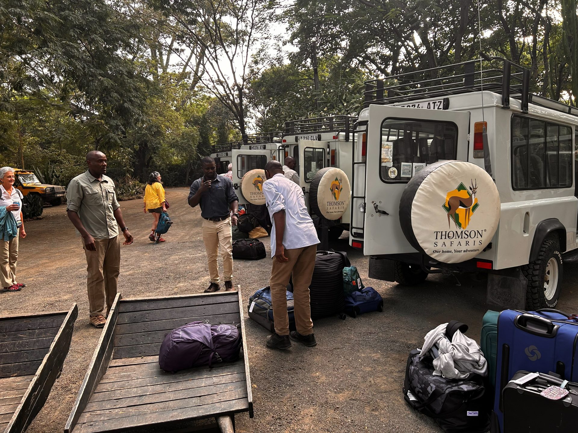 Packing up the Thomson Safaris Land Rovers to depart for Tarangire